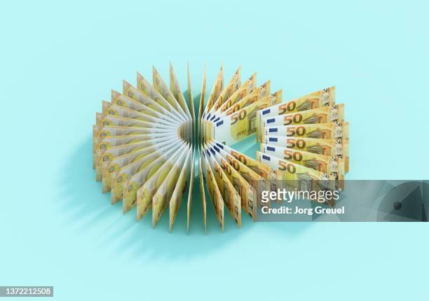 euro banknotes forming a circle/pie chart - european union abstract stockfoto's en -beelden