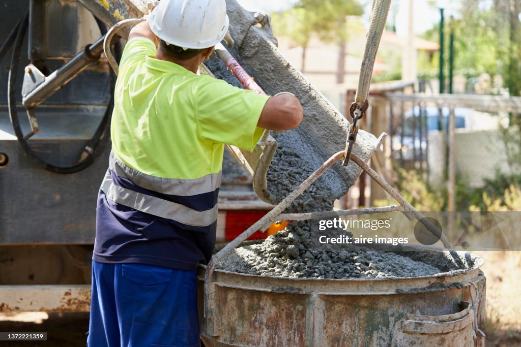 Construction site worker men standing preparation and protective safety clothes
