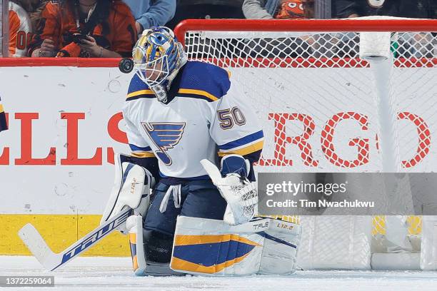 Jordan Binnington of the St. Louis Blues makes a save during the third period against the Philadelphia Flyers at Wells Fargo Center on February 22,...