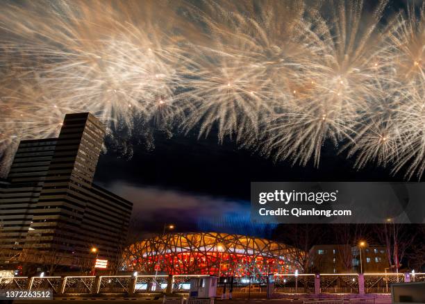 Fireworks explode over the Beijing National Stadium during the closing ceremony of the Beijing 2022 Winter Olympics on February 20, 2022 in Beijing,...