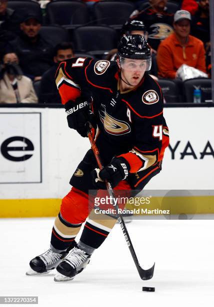 Cam Fowler of the Anaheim Ducks skates the puck against the San Jose Sharks in the second period at Honda Center on February 22, 2022 in Anaheim,...