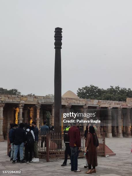 View of the Iron Pillar of Delhi in the Qutab Minar complex on February 20, 2022 in New Delhi,India.