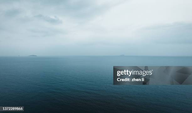 seascape on open ocean - grey overcast stock pictures, royalty-free photos & images