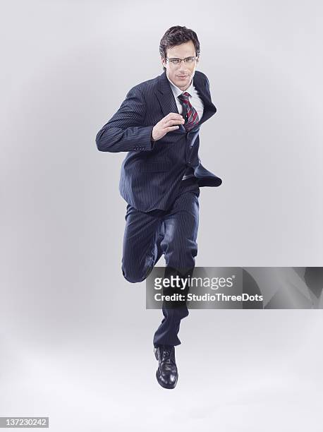 businessman in rush - runner front view stock pictures, royalty-free photos & images