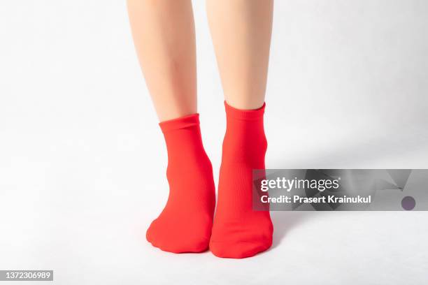 woman feets in red socks - socks ストックフォトと画像