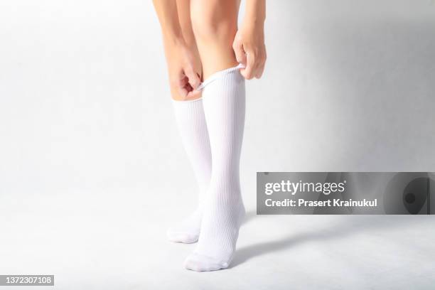 woman feets in white socks - socks ストックフォトと画像