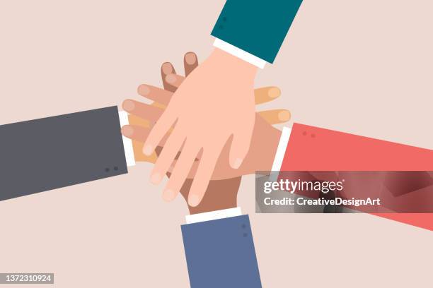 business people putting their hands together. colleagues showing team community, unity, partnership, cooperation and togetherness concept. - cartoon office background stock illustrations