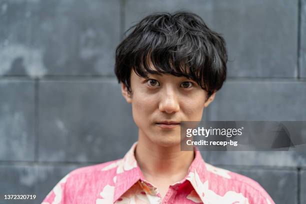 portrait of non-binary gender person - non binary stereotypes stock pictures, royalty-free photos & images