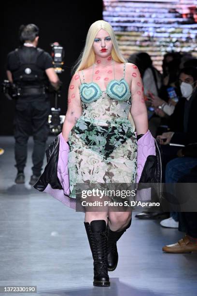 Model walks the runway at the Marco Rambaldi fashion show during the Milan Fashion Week Fall/Winter 2022/2023 on February 23, 2022 in Milan, Italy.