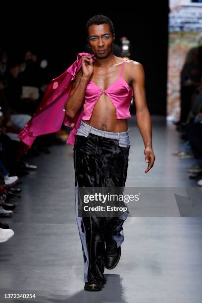 Model walks the runway at the Marco Rambaldi fashion show during the Milan Fashion Week Fall/Winter 2022/2023 on February 23, 2022 in Milan, Italy.