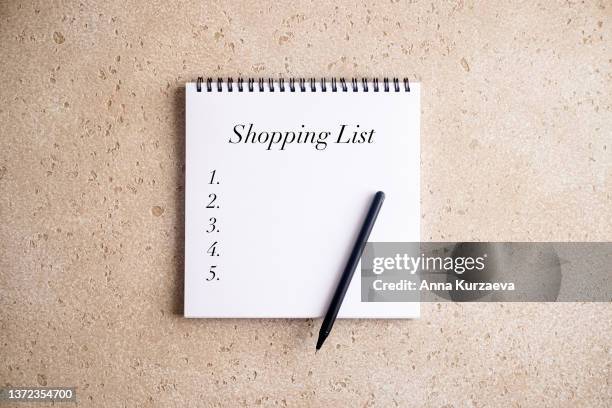 blank notepad shopping list from above, top view - shopping list stock pictures, royalty-free photos & images