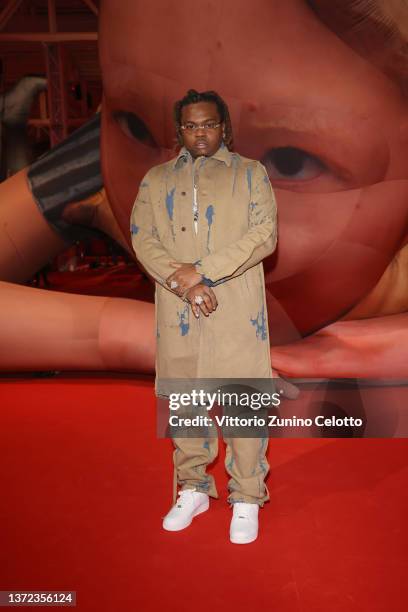 Gunna is seen at the Diesel Fashion Show during Milan Fashion Week Womenswear Fall/Winter 2022/23 on February 23, 2022 in Milan, Italy.