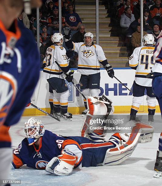 David Legwand of the Nashville Predators celebrates his goal at 11:37 of the first period against Kevin Poulin of the New York Islanders at the...