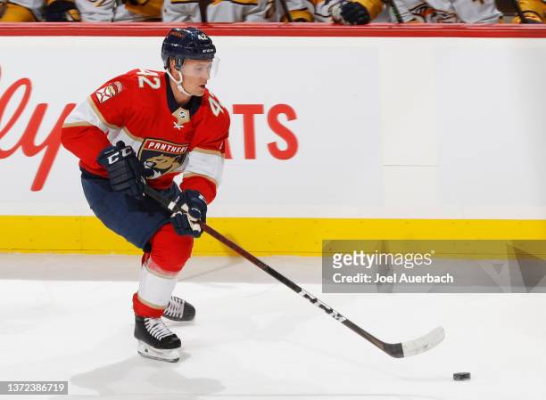 Gustav Forsling of the Florida Panthers xskates with the puck against the Nashville Predators at the FLA Live Arena on February 22, 2022 in Sunrise,...