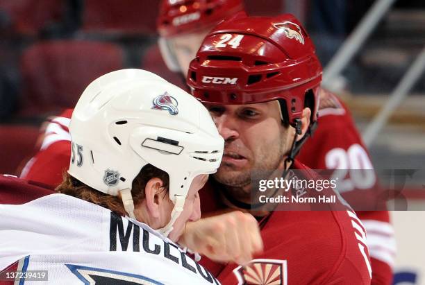 Kyle Chipchura of the Phoenix Coyotes connects with a right hook on Cody McLeod of the Colorado Avalanche at Jobing.com Arena on January 16, 2012 in...