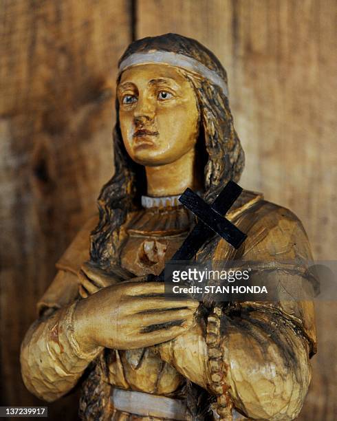 Wooden statue of Kateri Tekakwitha, a 17th century Mohawk woman who the Vatican will canonize later this year, seen in St. Peter's Chapel at the...