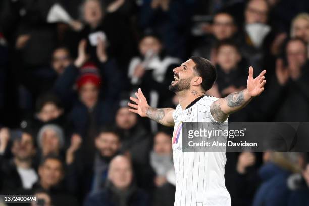 Aleksandar Mitrovic of Fulham celebrates after scoring their team's first goal during the Sky Bet Championship match between Fulham and Peterborough...