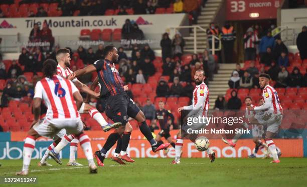 Cameron Jerome of Luton Town scores their second goal during the Sky Bet Championship match between Stoke City and Luton Town at Bet365 Stadium on...