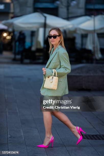 Sonia Lyson is seen wearing pink heels Zara, beige Lady Dior bag, Lumina green checkered suit, shorts & blazer, cropped sports top Ducie, Celine...