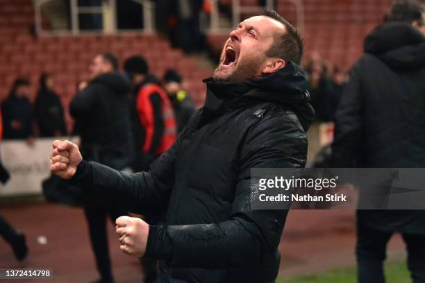 Nathan Jones manager of Luton Town celebrates after the Sky Bet Championship match between Stoke City and Luton Town at Bet365 Stadium on February...