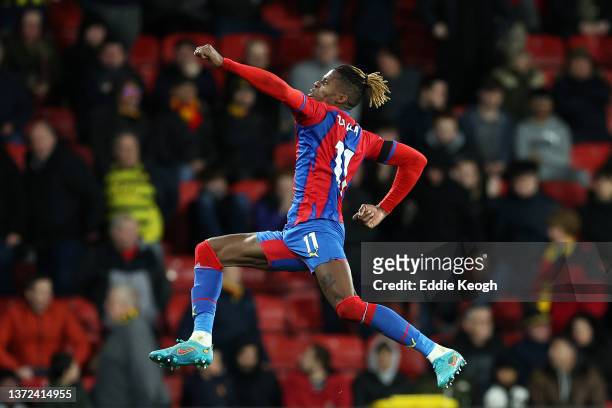 Wilfried Zaha of Crystal Palace celebrates after scoring their team's fourth goal during the Premier League match between Watford and Crystal Palace...