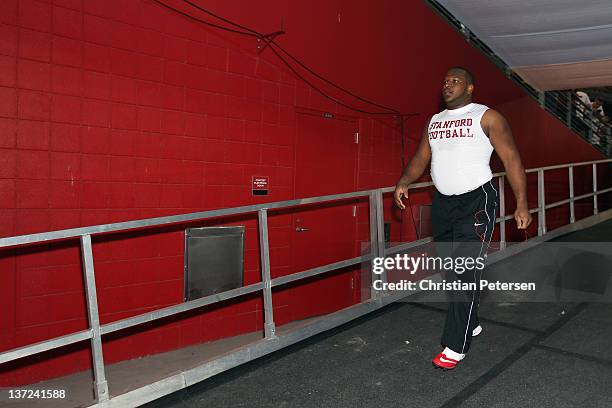 Terrence Stephens of the Stanford Cardinal walks back to the locker room after warm ups against the Oklahoma State Cowboys during the Tostitos Fiesta...