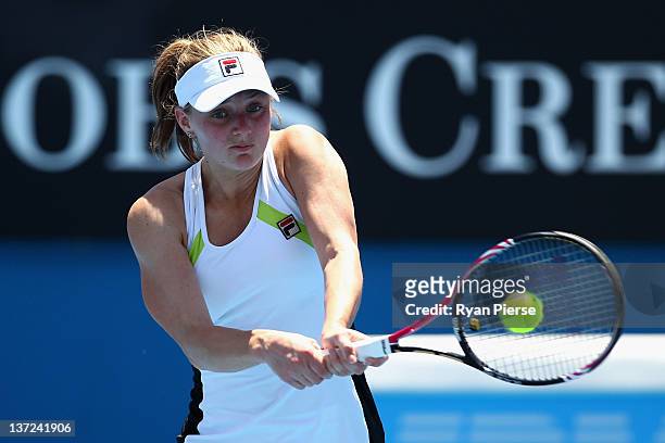Anna Chakvetadze of Russia plays a backhand in her first round match against Jelena Dokic of Australia during day two of the 2012 Australian Open at...