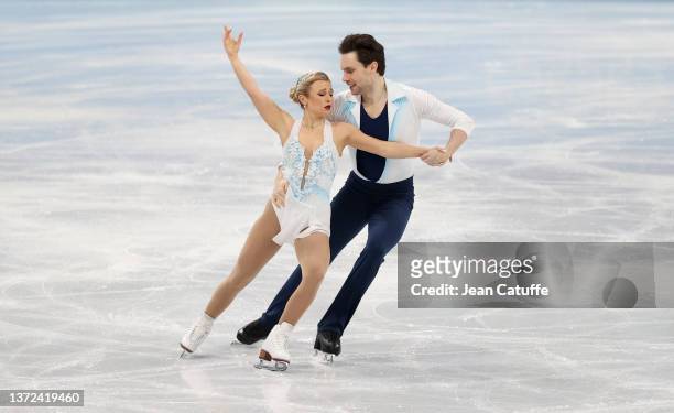 Kirsten Moore-Towers and Michael Marinaro of Team Canada skate during the Pair Skating Free Skating on day fifteen of the Beijing 2022 Winter Olympic...
