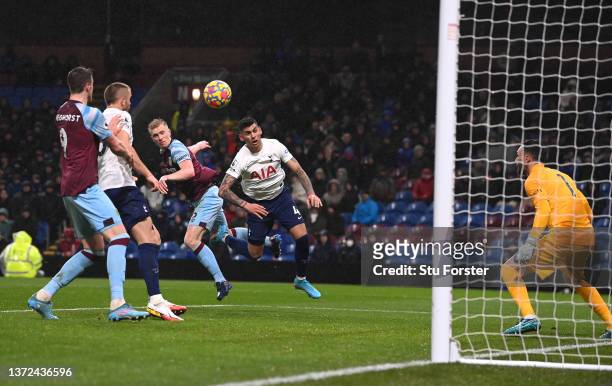 Burnley player Ben Mee beats Tottenham player Cristian Romero to head the winning goal during the Premier League match between Burnley and Tottenham...