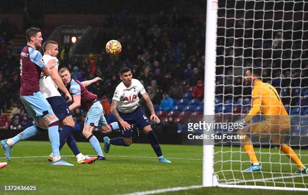 Burnley player Ben Mee beats Tottenham player Cristian Romero to head the winning goal during the Premier League match between Burnley and Tottenham...
