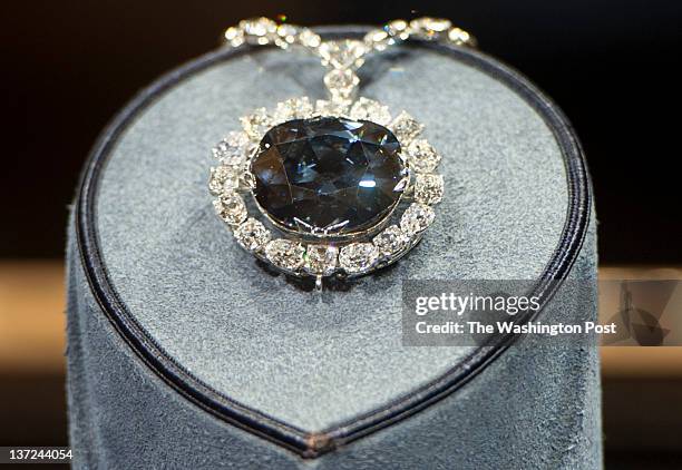 Dozens of tourists visit the Harry Winston exhibition Hall to see the Hope diamond with 45. 52 carats in the Smithsonian National Museum of Natural...