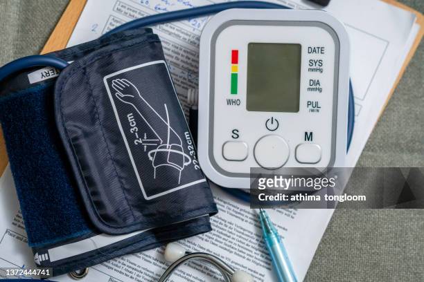 high  angle view of blood pressure gauge. - high blood pressure stockfoto's en -beelden