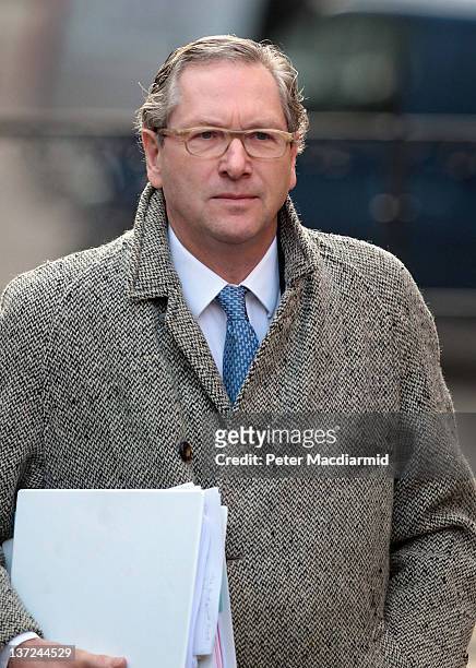 John Witherow, editor of The Sunday Times, arrives at The High Court to give evidence to the Leveson Inquiry on January 17, 2012 in London, England....