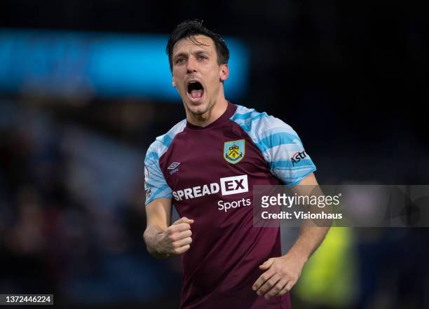 Jack Cork of Burnley celebrates after the Premier League match between Burnley and Tottenham Hotspur at Turf Moor on February 23, 2021 in Burnley,...