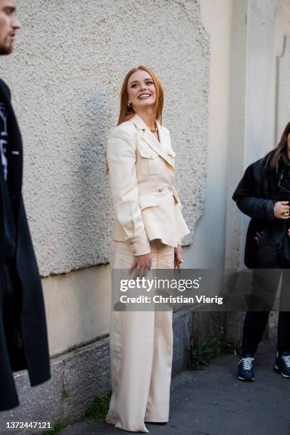 Actress Abigail Cowen wearing outside of Alberta Ferretti fashion show during the Milan Fashion Week Fall/Winter 2022/2023 on February 23, 2022 in...