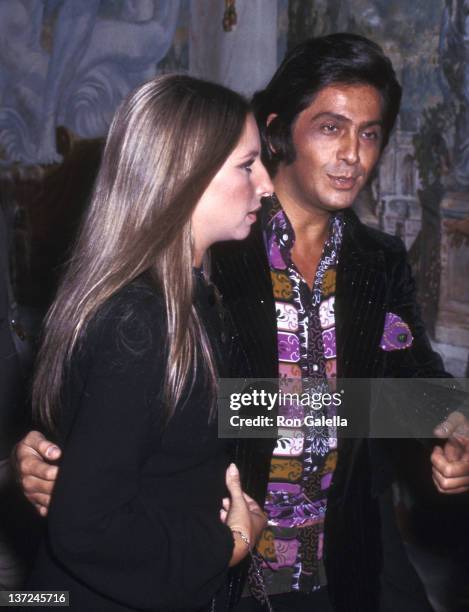 Actress/Singer Barbra Streisand and fashion designer Valentino attend Valentino's Fashion Show on September 27, 1970 at the Pierre Hotel in New York...