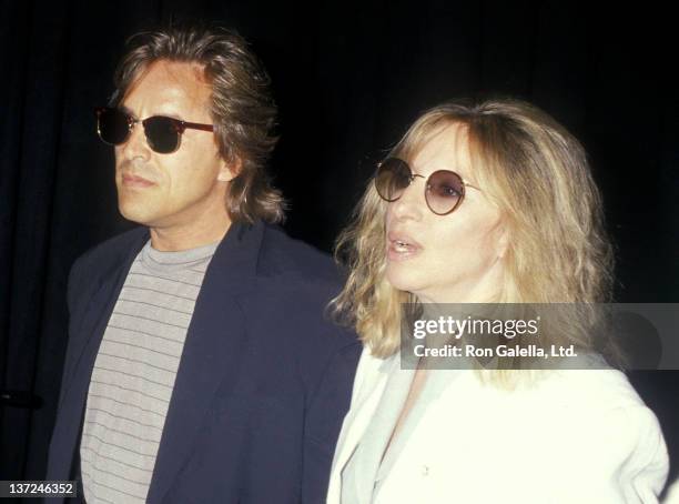 Actor Don Johnson and actress/singer Barbra Streisand attend the 14th Annual NATO/ShoWest Convention - Tri-Star Pictures Luncheon on February 24,...