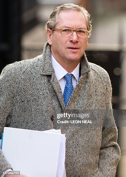 South Africa-born journalist John Witherow, the editor of the Sunday Times newspaper, arrives at the High Court in central London on January 17 to...