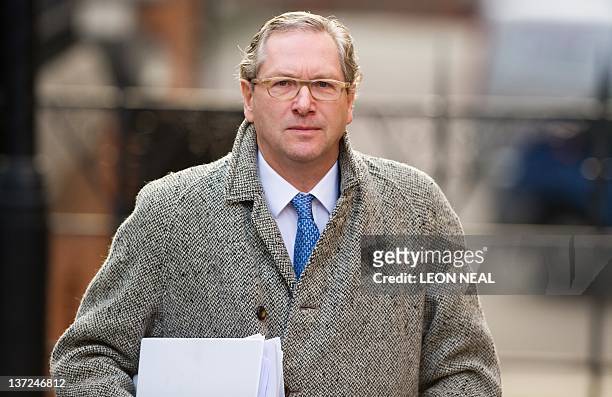 South Africa-born journalist John Witherow, the editor of the Sunday Times newspaper, arrives at the High Court in central London on January 17 to...