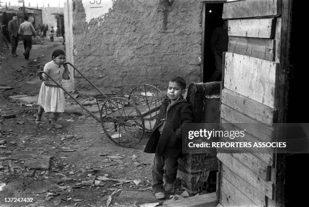 Algerian immigrants in one of the first slums during March 1962 in the Paris area, in Nanterre, France. .