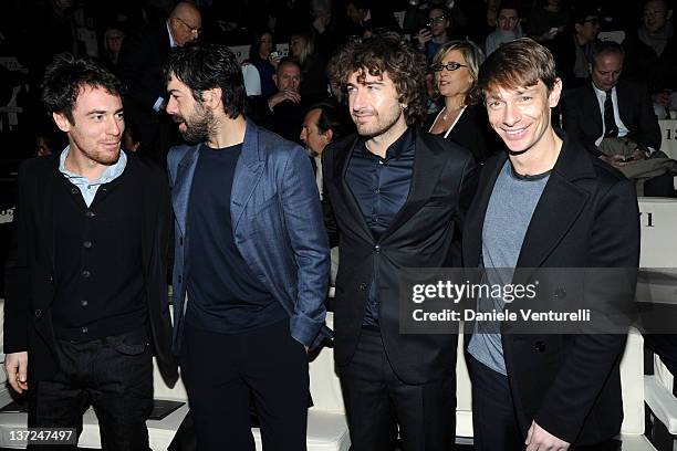 Elio Germano, Pierfrancesco Favino, Alessandro Siani and Giorgio Pasotti attend the Giorgio Armani fashion show as part of Milan Fashion Week...