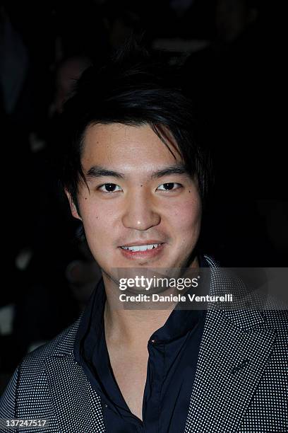 Ray Chen attend the Giorgio Armani fashion show as part of Milan Fashion Week Menswear Autumn/Winter 2012 on January 17, 2012 in Milan, Italy.