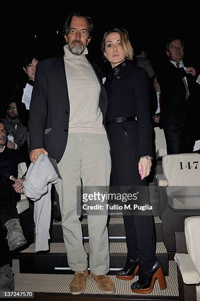 Giovanni Gastel and Francesca Senette attend the Giorgio Armani fashion show as part of Milan Fashion Week Menswear Autumn/Winter 2012 on January 17,...