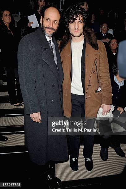 Luca Guadagnino and Louis Garrel attend the Giorgio Armani fashion show as part of Milan Fashion Week Menswear Autumn/Winter 2012 on January 17, 2012...