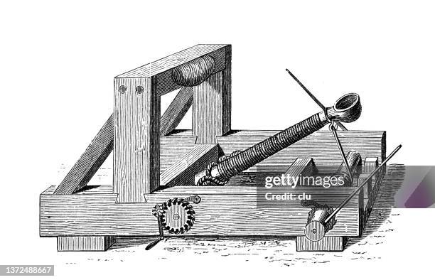 loaded siege slingshot ballista - catapult stock illustrations