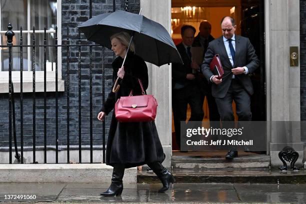 British Foreign Secretary Liz Truss departs Downing Street after British Prime Minister Boris Johnson chaired an emergency Cobra meeting to discuss...