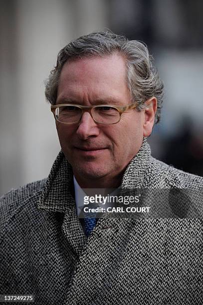 South Africa-born journalist John Witherow, editor of The Sunday Times newspaper, arrives at the High Court in central London on January 17 to give...
