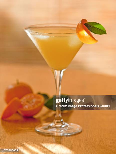 a tangerine martini - tangerine martini stock pictures, royalty-free photos & images