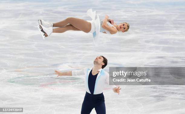 Kirsten Moore-Towers and Michael Marinaro of Team Canada skate during the Pair Skating Free Skating on day fifteen of the Beijing 2022 Winter Olympic...