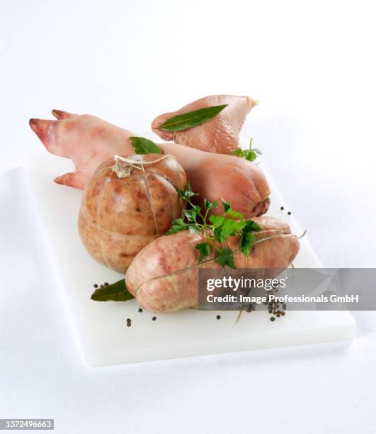 cotechino e zampone (sausage and stuffed pig's trotter, italy) - trotter stock pictures, royalty-free photos & images